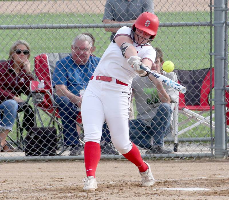 Ottawa's McKenzie Oslanzi smacks a hit against Morris on Monday, May 15, 2023 at Ottawa High School.