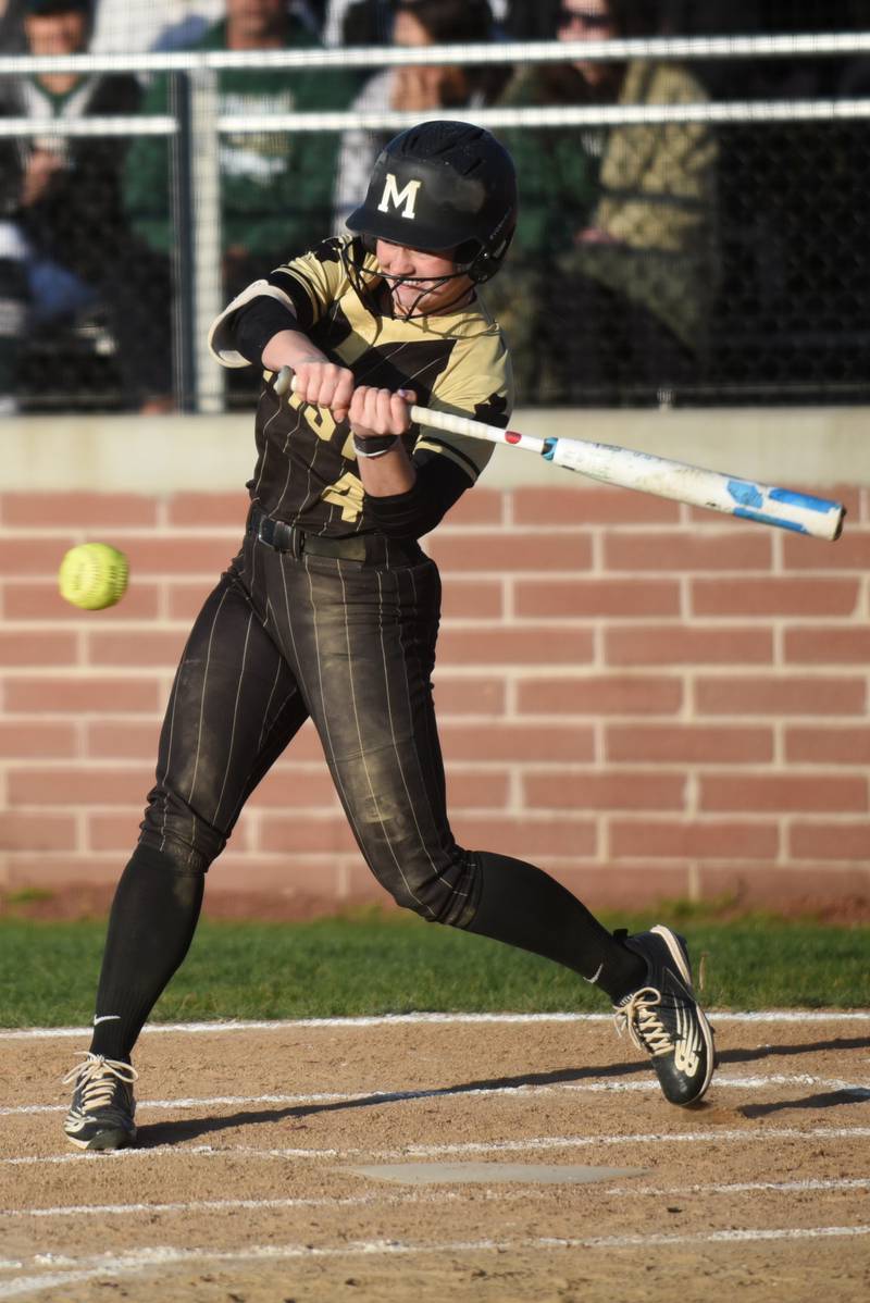 Bishop McNamara's Teagan McCue hits a pitch during a game at Bradley-Bourbonnais Thursday, May 8 2025.