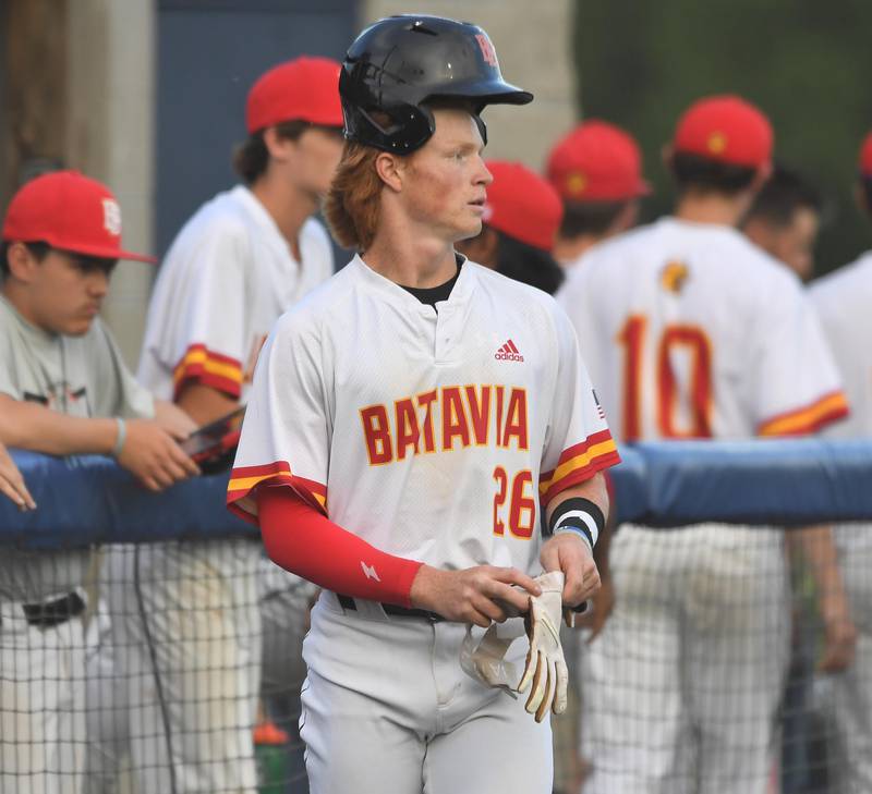 Batavia’s Jackson Bland wears his batting helmet on top of his head before his first at-bat against Wheaton Warrenville South in a Class 4A sectional semifinal game in Elgin on Wednesday, May 31, 2023.