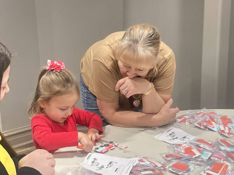 June Rose and her grandma Pat Komperda work on a foam train at the Joliet Area Historical Museum's Valentine's Day Party on Feb. 8, 2025.