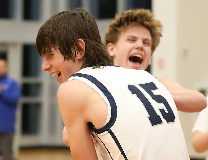 Fieldcrest's Brady Ruestman reacts with teammate Edmond Lorton after winning the MVP of the the 49th annual Colmone Classic on Saturday, Dec. 9, 2023 at Hall High School.