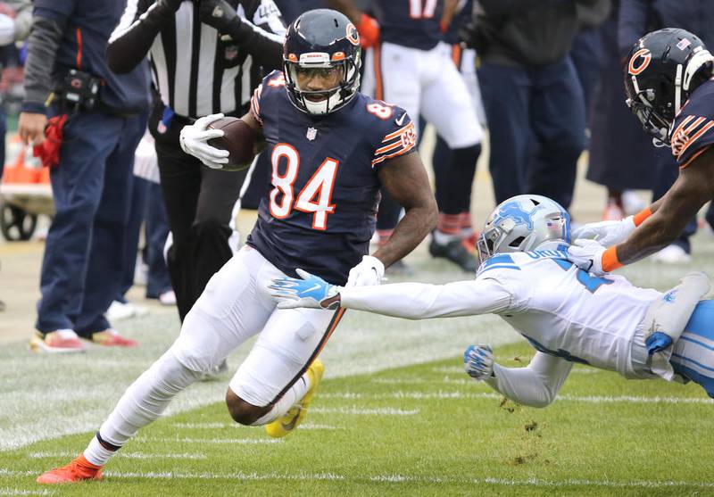 Chicago Bears wide receiver Cordarrelle Patterson (84) gets past the outstretched arms of Detroit Lions cornerback Amani Oruwariye (24) during their game at Soldier Field in Chicago.
