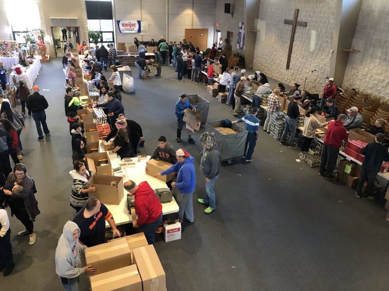 Volunteers helped to pack and distribute 400 Thanksgiving food boxes Saturday, November 18, 2023, at at the Church of the Holy Apostles in McHenry. The Knights of Columbus Councils 1288 and 16446, both of McHenry, have lead the holiday food program for 15 years.