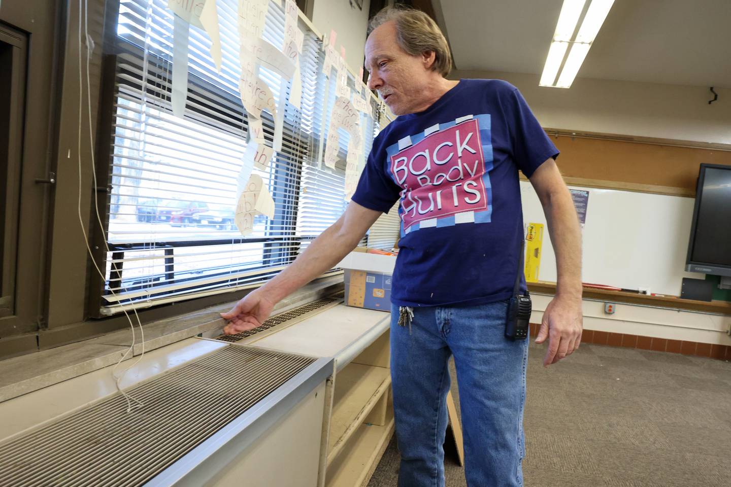 Rick Neufeld, longtime custodian, points out the effects of the structural damage at Edison Primary School in Kankakee on Jan. 7, 2026, following the school's emergency closure by Kankakee School District 111. Teachers worked to pack up their classrooms over the past week to move into available classrooms in nearby schools.