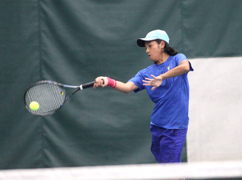 Wheaton North’s Henry Ros returns the ball toIan Bliss of Normal Community (not pictured) during the first round of the 2A IHSA boys tennis state championships at the Five Star Tennis Center in Plainfield on Thursday, May 26, 2022.