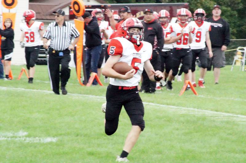 Amboy’s Landon Whelchel runs for a TD Saturday, Sept. 24, 2022 against Orangeville.