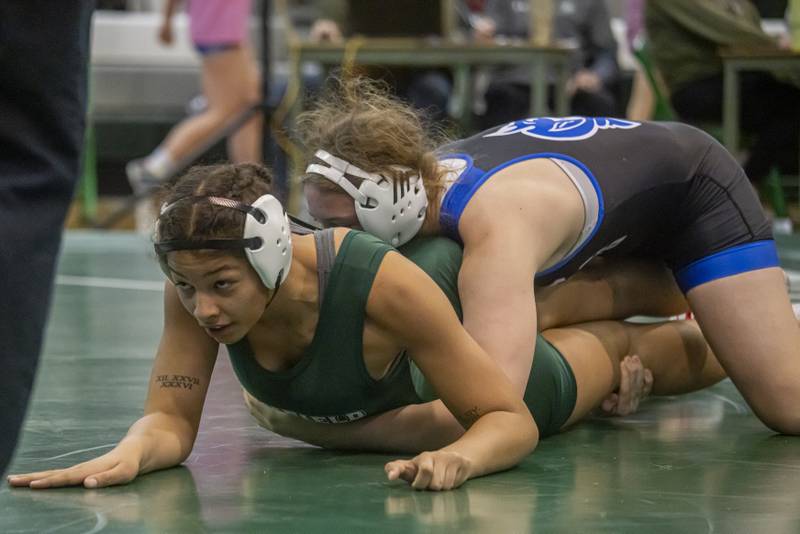 Alicia Tucker of Plainfield Central High School takes second place at sectionals to Kiernan Farmer of Peotone High School during girls wrestling sectionals at Geneseo High School on February 10, 2024.