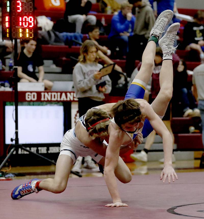 Marian Central’s Austin Hagevold tosses Johnsburg’s Chase Vogel in the 113-pound championship match of the IHSA 1A Marengo Wrestling Regional on Saturday, Feb. 8, 2025, at Marengo High School.