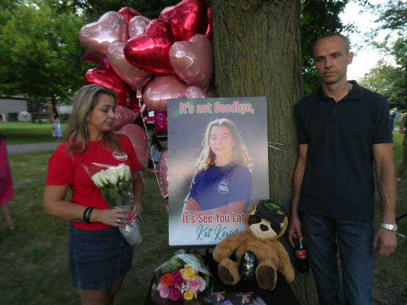 Katarzyna Koziara and her husband Marcin Koziara attend a memorial service for their dauthter Katriona Koziara, 13, on Friday, August 19, 2022, at Waverly Park, Rolling Meadows.