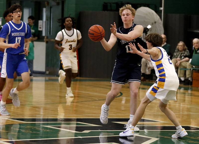 Cary-Grove's Landon Nawracaj passes the ball as he brings the ball up the court against Jacobs' Johnny Krupsky during the boy’s game of McHenry County Area All-Star Basketball Extravaganza on Sunday, April 13, 2025, at Alden-Hebron’s Tigard Gymnasium in Hebron.