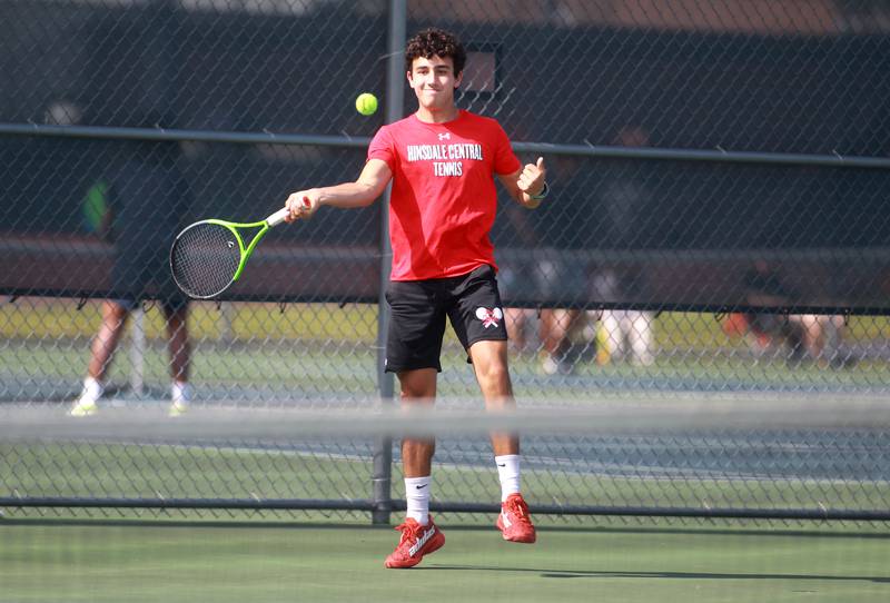 Hinsdale Central’s Bodie Teuscher returns the ball during a doubles match with partner Aidan Hernandez (not pictured) in the state championship preliminaries at Buffalo Grove High School on Thursday, May 23, 2024.