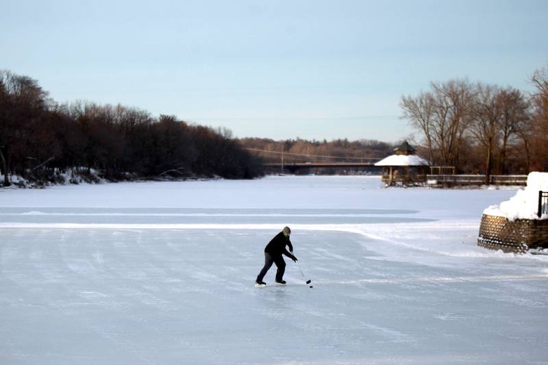 Tom Edwards of Batavia was one of the first onto the ice at the Batavia Depot Pond after several days of sub-freezing weather. The Batavia Park District declares the ice safe for skating once it reaches eight inches or greater of ice.