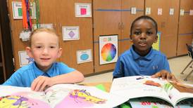 Joliet Schools District 86 students receive bags of books donation