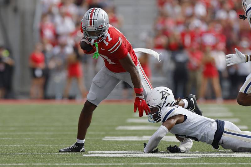 Ohio State receiver Carnell Tate plays against Akron during an NCAA college football game Saturday, Aug. 31, 2024, in Columbus, Ohio. (AP Photo/Jay LaPrete)