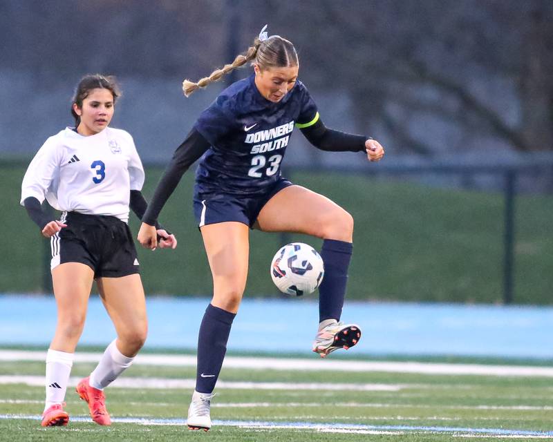 Downers Grove South's Ashley Molinari (23) handles the ball during soccer match between Riverside-Brookfield at Downers Grove South.  April 10, 2025.