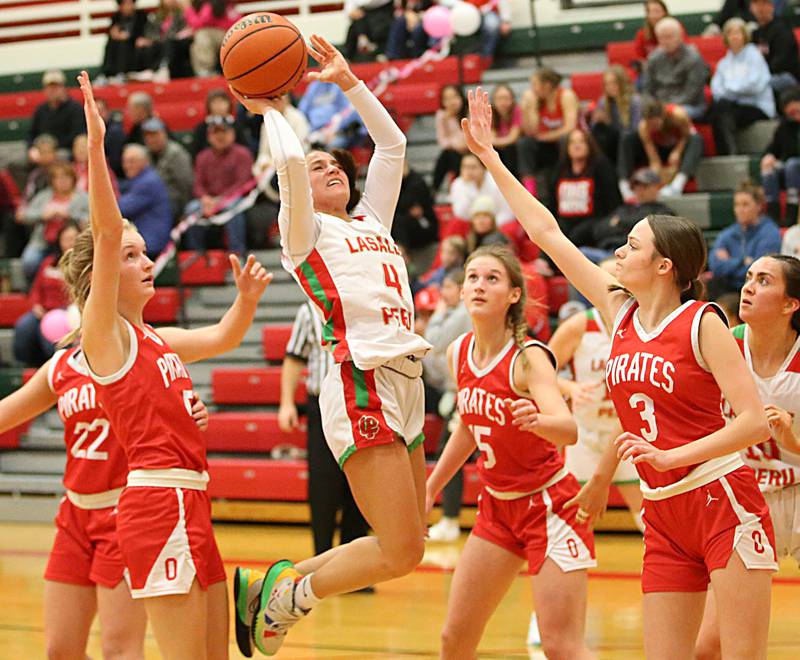 L-P's Brooklyn Ficek runs into the lane to score on a drive to the hoop past Ottawa defenders on Friday, Jan. 27, 2023 at L-P High School.