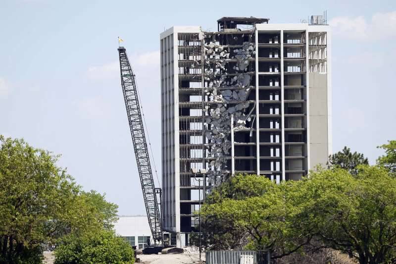 A 90-foot crane is being used to take down the tower on former Pheasant Run Resort in St. Charles. The demolition work started Friday.
