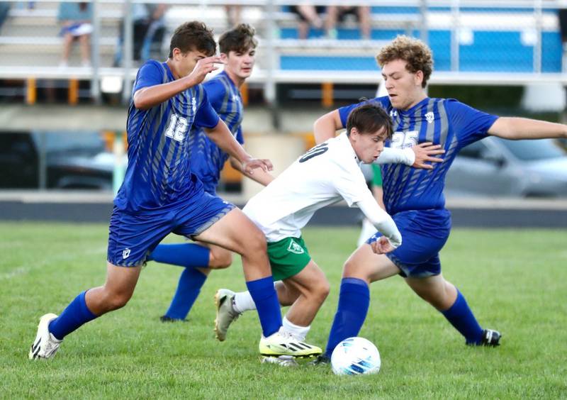 Princeton's Asa Gartin and Michael Smith battle against Alleman Thursday night at Bryant Field. The visiting Pioneers won 8-0.
