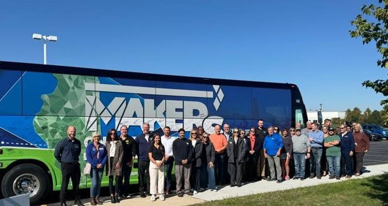 The public is invited to celebrate centennial manufacturers and farms on Oct. 8, 2025, when the “Makers on the Move” Bus Tour rolls into DeKalb County. (Bus shown here with participants from a previous year)
