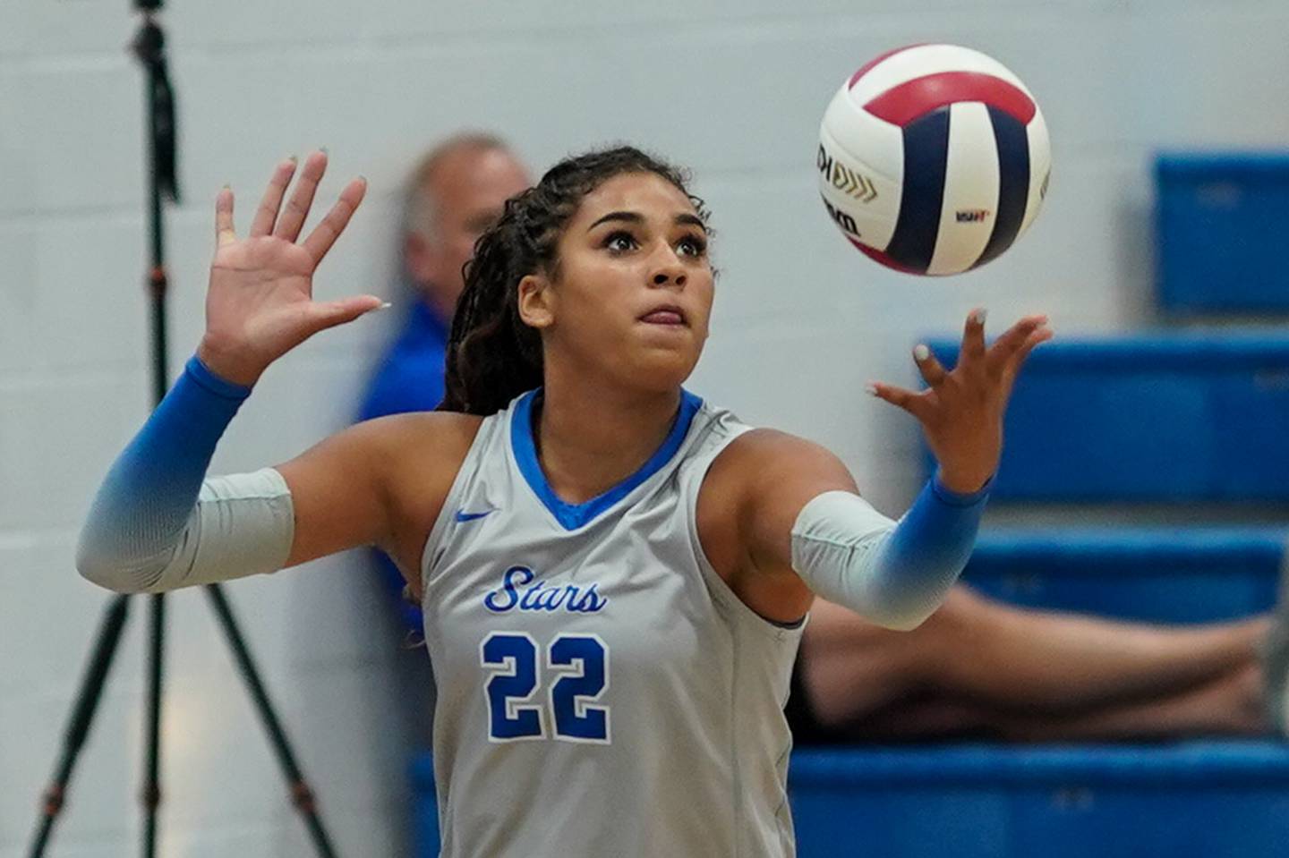 St. Charles North's Sidney Wright (22) serves the ball against Rosary during a volleyball game at Rosary High School in Aurora on Monday, Aug 25, 2025.