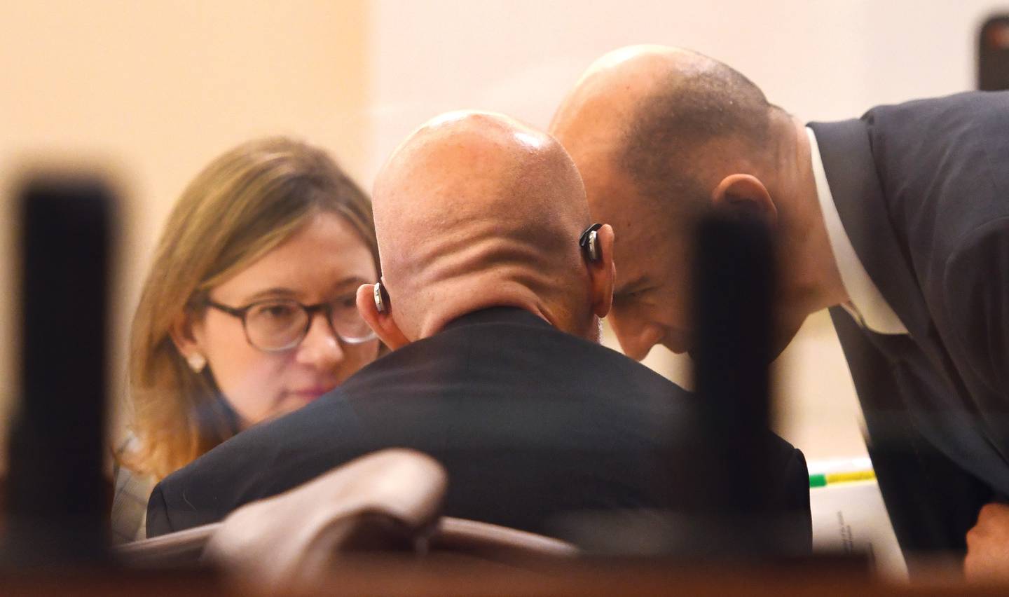 Ogle County State's Attorney Mike Rock confers with his assistants Allison Huntley (left) and Matthew Leisten on Thursday, Jan. 22, 2026 during the murder-arson trial for Duane C. Meyer. Meyer is charged with killing his ex-wife and their son in October 2016.