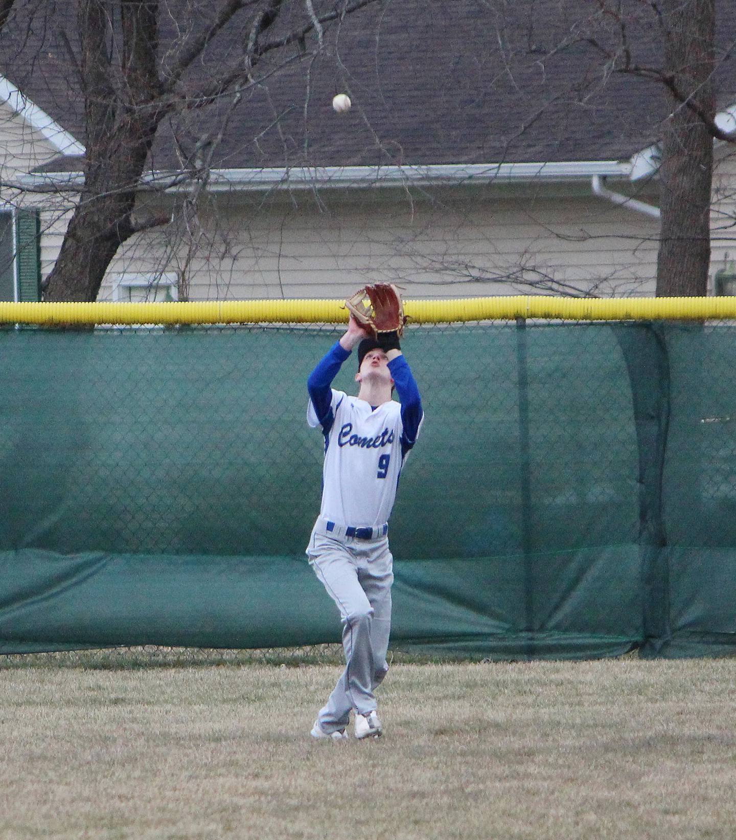 Newman's Joe Oswalt catches a fly ball in left field against Kewanee on Thursday, March 30, 2023 during their Three Rivers East game in Sterling.