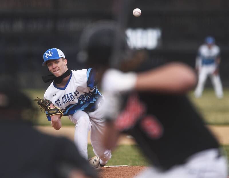 Paul Valade/pvalade@dailyherald.com
St. Charles North pitcher Joshua Kennedy throws to a Wheaton Warrenville South's batter during Tuesday's baseball game in St. Charles.
