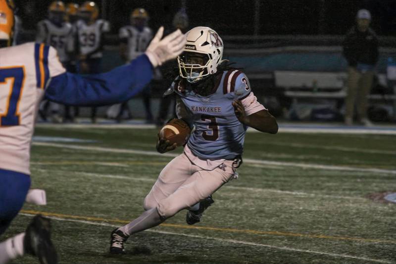 Kankakee's Cedric Terrell III pushes toward the 50-yard line against Crete-Monee during the game on Friday, Oct. 24th, 2025.