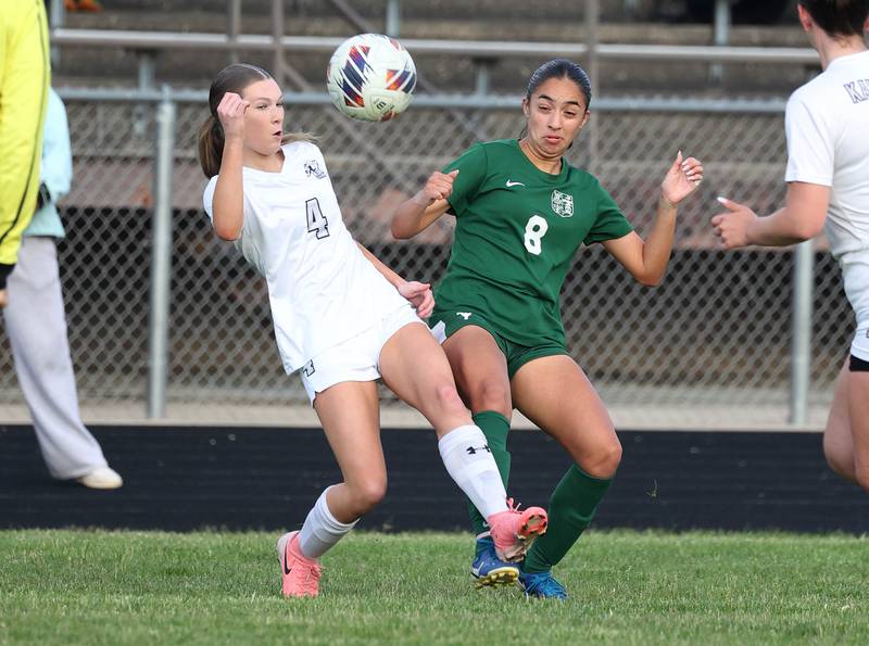 Kaneland's Olivia Davis (left) and Boylan's Johanna Hawley try to win possession Wednesday, May 28, 2025, during their Class 2A sectional semifinal game at Belvidere High School.