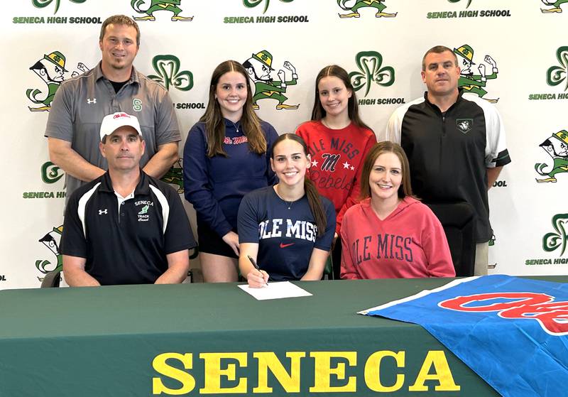 Seneca’s Teagan Johnson has signed to continue her education at the University of Mississippi, aka Ole Miss, in University, Miss., and her track and field career at the NCAA Division I level with the Rebels. Johnson was a sectional champion and state qualifying pole vaulter for the Fighting Irish, earning a spot on the 2024 Times All-Area Girls Track and Field Honor Roll. Pictured (from the left) are: in front – Jim Johnson, Teagan Johnson and Karissa Johnson; in back – Seneca track and field coach Terry Maxwell, Riley Johnson, Talia Johnson, and Seneca AD Ted O’Boyle.