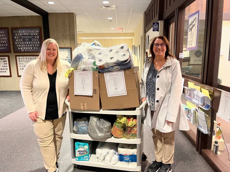Illinois Valley Community College nursing instructors Chrissy Boughton (left) and Tracey Antle led a monthlong campaign that collected a cartload of supplies for Illinois Valley Public Action to Deliver Shelter.
