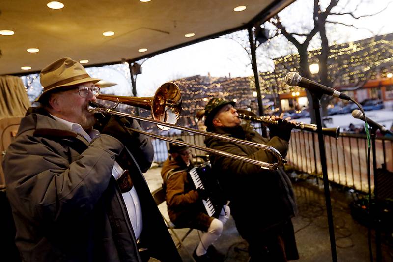 Polka music is played by Dana Legg, Jim Merola, and Mike Knauf from Die Musikmeisters entertain the crowd Thursday, Feb, 2, 2023, during the annual Groundhog Day Prognostication on the Woodstock Square.