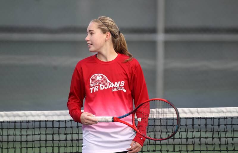 Timothy Christian’s Chrystina Lee smiles after a win in the first round during the first day of the IHSA state tennis tournament at Rolling Meadows High School on Thursday, Oct. 20, 2022.