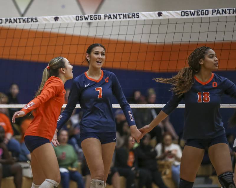 Oswego's Hannah Herrick (7) celebrates a kill during volleyball match between Romeoville at Oswego. Oct 16, 2025.