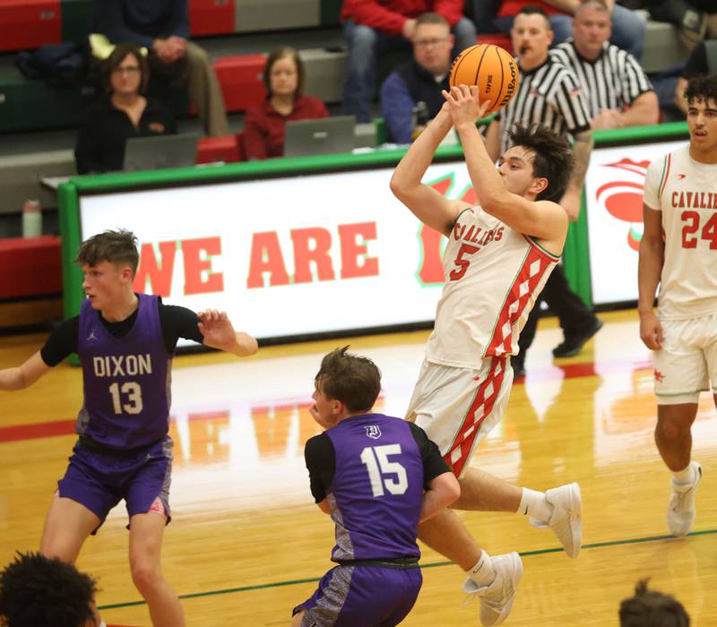 L-P's Erick Sotelo shoots a jump shot on the run over Dixon's Jimi Gosinski on Tuesday, Jan. 20, 2026 in Sellett Gymnasium at L-P High School.