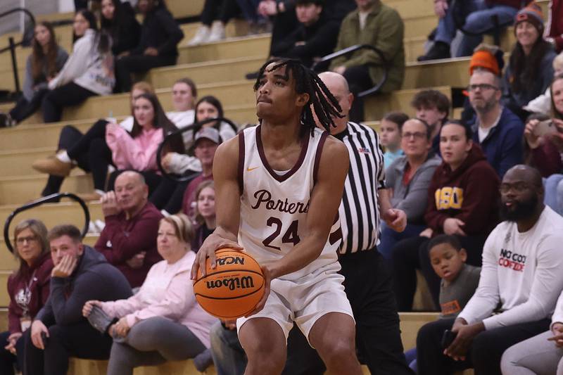 Lockport’s Izeyah Pruitt lines up the deep shot against Plainfield North on Friday, Jan. 3, 2025 in Lockport