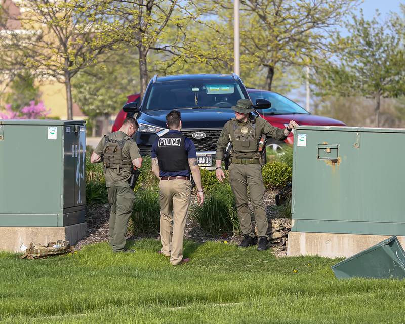 Officers at the scene of a hostage situation on May 10, 2022 at Fifth Third Bank in Romeoville.