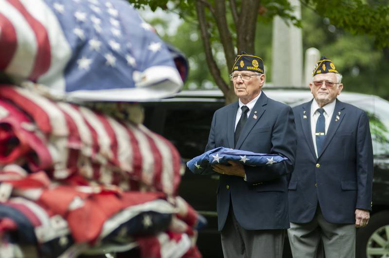 Morrison American legion commander Larry Zuidema prepares to respectfully retire 598 flags that have served their duty. The ceremony was held at Veterans Memorial Park Sunday, Sept. 25, 2022.