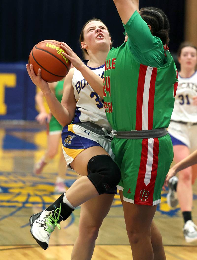 Somonauk's Haley McCoy goes to the basket against LaSalle-Peru's Jasmine Garman during their game Thursday, Nov. 16, 2023, in the Tim Humes Breakout girls basketball tournament at Somonauk High School.