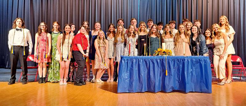 Sixteen students were inducted into Morrison High School’s chapter of the National Honor Society on Wednesday, March 26 during an evening ceremony in the high school’s auditorium.
