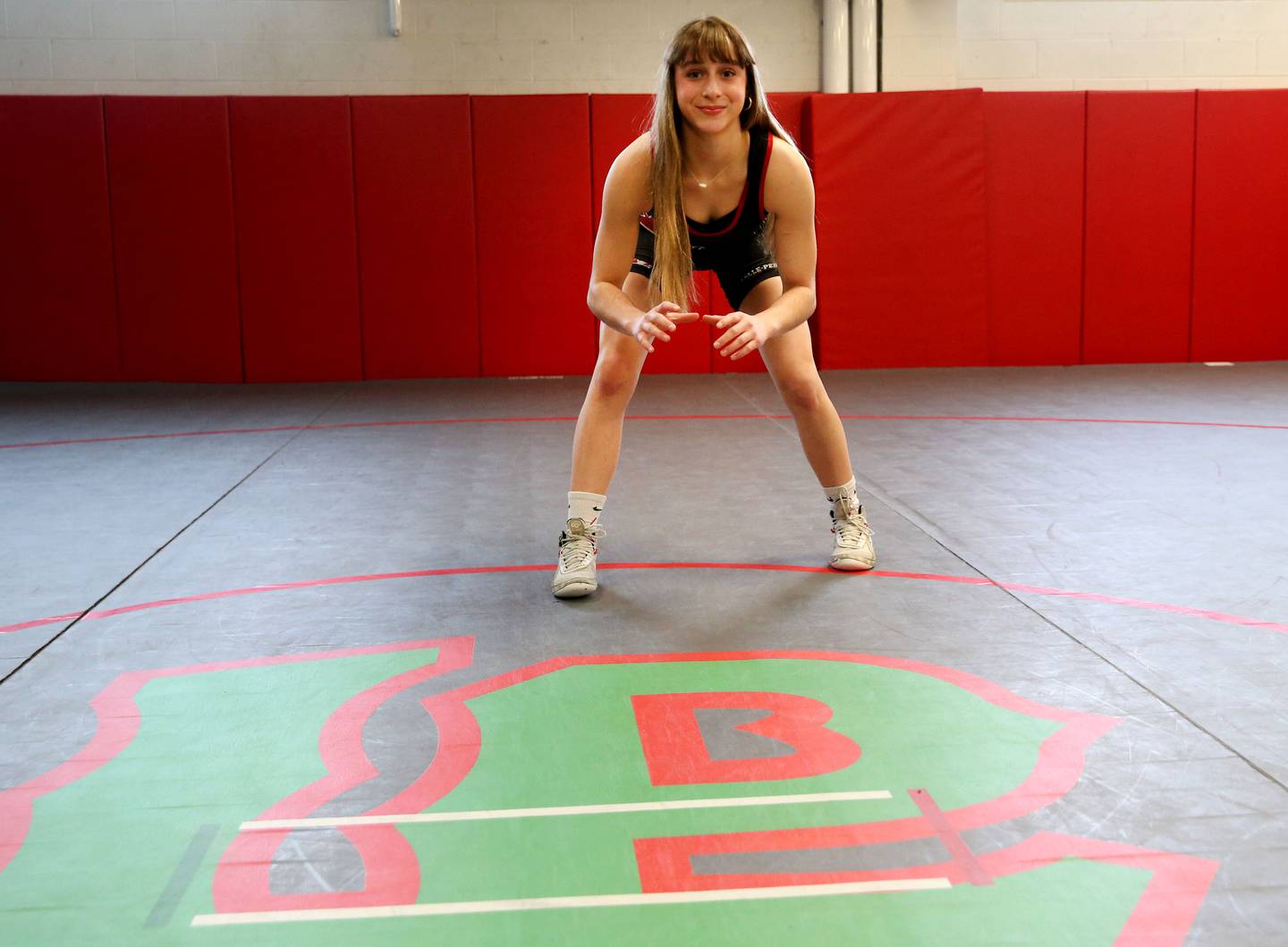 L-P's Kiely Domyancich poses for a photo in the L-P wrestling room on Tuesday, March 11, 2025. Domyancich is the 2025 NewsTribune girls wrestler  of the year.
