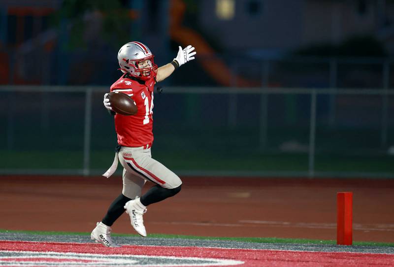 Palatine's Kole Fager (14) celebrates a touchdown Friday, Sept. 5, 2025 in Palatine.