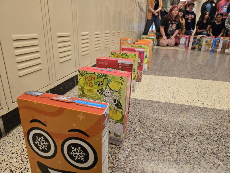 Roughly 750 cereal boxes were set up in the CTE hallway of Streator High School to be knocked over in domino fashion Tuesday, March 18, 2025.
