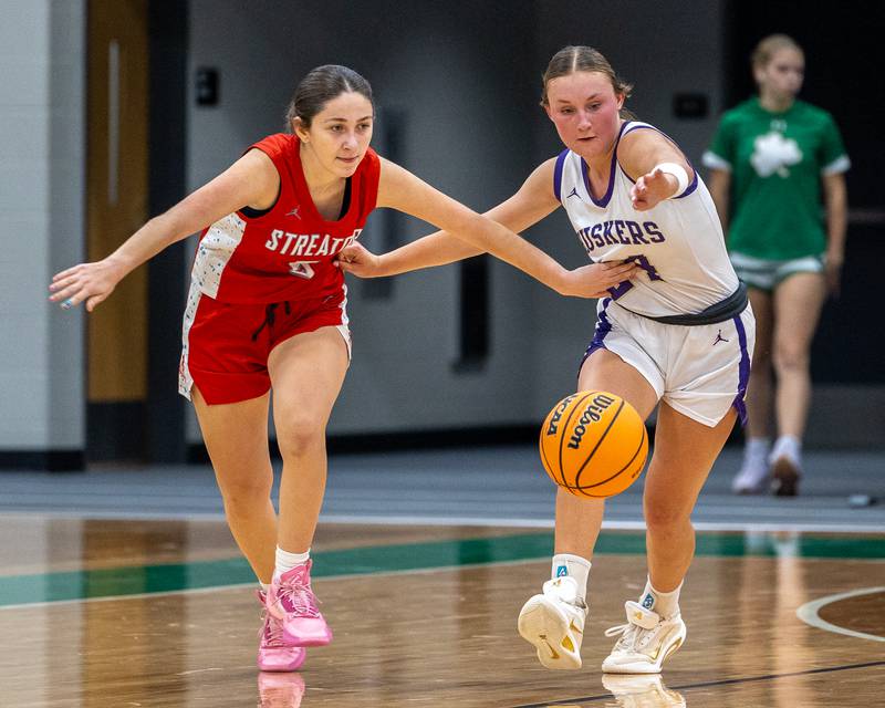 Audrey Arambula (5) of Streator loses dribble and runs after ball alongside Anna Hjerpe (24) of Serena on Monday, November 17, 2025 at Seneca High School in Seneca.
