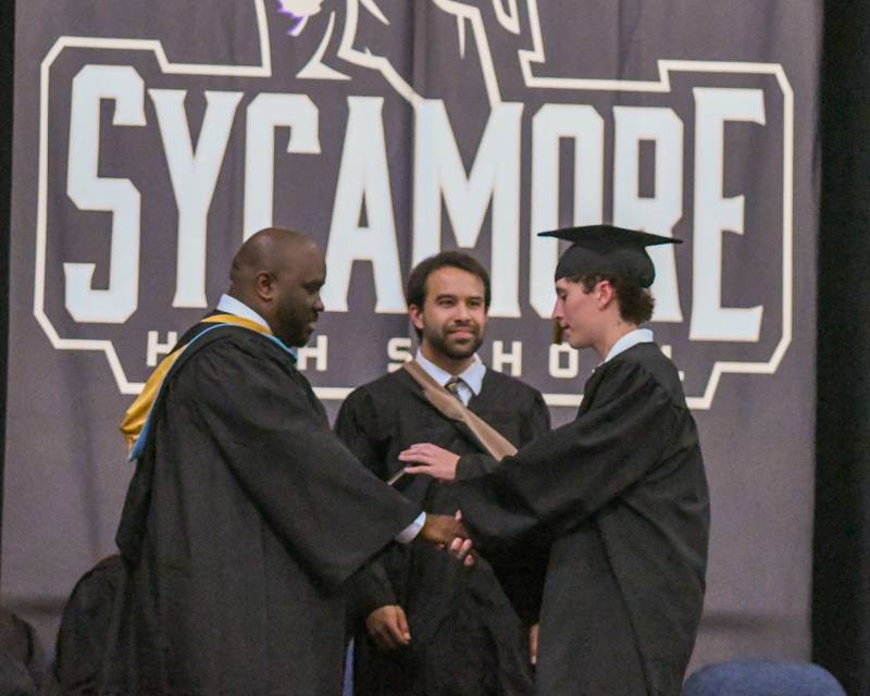 A Sycamore graduate receives his diploma on Sunday May 24, 2026, during the graduation ceremony held at Sycamore High School.