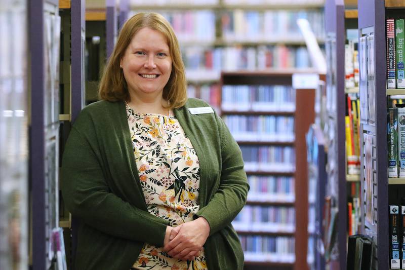 McHenry Public Library District Executive Director Lesley Jakacki poses for a portrait at the library on Wednesday, March 3, 2021 in McHenry.