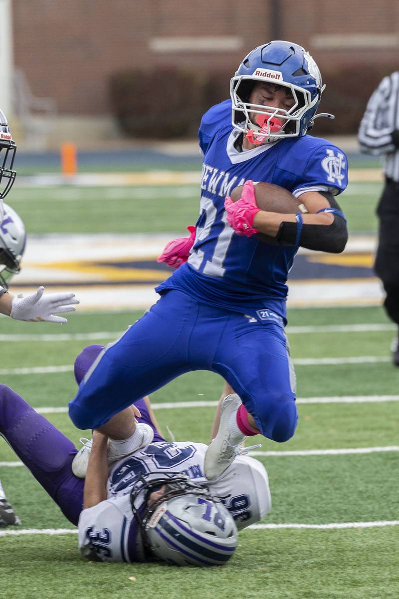 Newman’s Rylan Alvarado maintains his balance against Ridgeview-Lexington Saturday, Nov. 1, 2025, in round one of the Class 2A football playoffs.