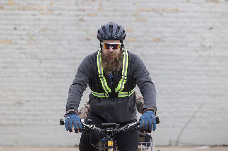 Jason Howlett loads up for the annual New Year's Day bike ride Wednesday, Jan. 1, 2025. Howlett and Kelly Jackson have bought Green River Cyclery in Dixon. Their first day of business was Jan. 2.