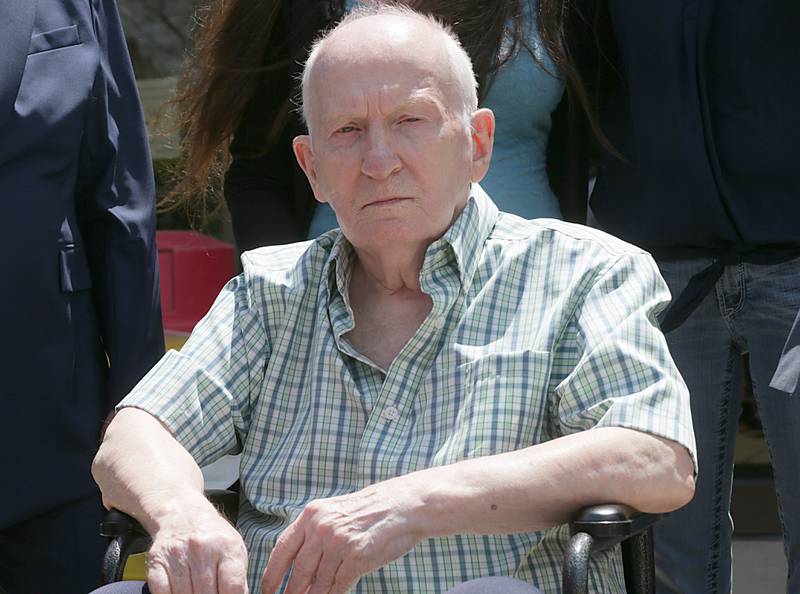 Chester Weger is wheeled out of the courthouse in a wheelchair at the La Salle County Government Complex after his hearing at the on Monday, Aug. 1, 2022 in Ottawa.