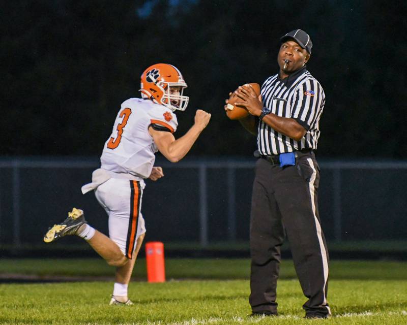 Byron Branden Smith celebrates by doing a fist pump after giving the referee the ball on a long running play in the first quarter against Geno-Kingston on Friday Sep. 16th while on the road at Geno-Kingston.